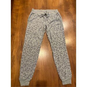 Woman’s Victoria’s Secret pink leopard print joggers from 2013 size small